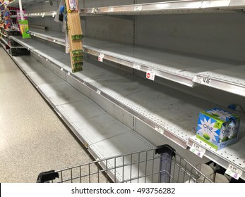 FORT LAUDERDALE, FL, USA:  Supermarket Aisle Of Bottled Water Is Sold Out At A Grocery Store As Residents Shop  Prepare For Hurricane Matthew, A Dangerous Category 5 Storm As Seen On October 5, 2016.