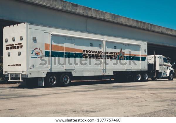 Fort Lauderdale, Florida - April 22,\
2019: Broward Sheriff Truck staying and ready to go in Fort\
Lauderdale Fire and Rescue Department in Fort Lauderdale,\
FL