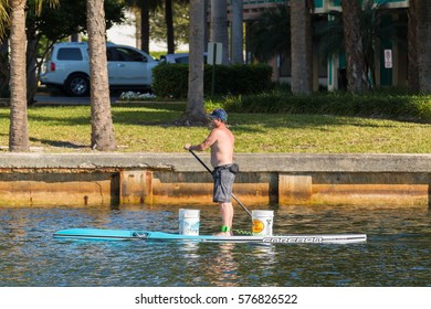 FORT LAUDERDALE, FLORIDA - FEB 5: Middle Age Man Enjoys A Workout On His Stand Up Paddle Board On The Middle River On 5 Feb 2017 At Fort Lauderdale