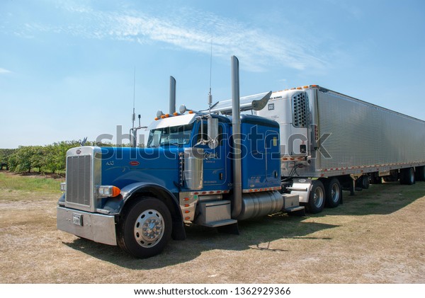 Fort Lauderdale, Florida - March 27 2011:\
Classical blue american truck on\
roadside