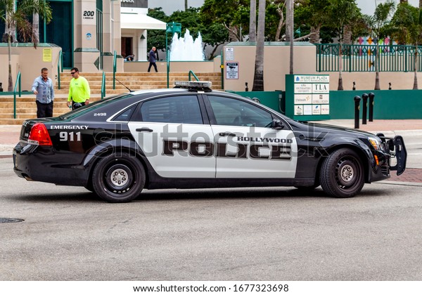Fort Lauderdale, Florida / USA - 1/30/2019:\
Up Close of a black and white Hollywood Police interceptor cruiser\
car. GM 2018 Chevrolet Caprice automobile by General Motors\
Corporation. High\
performance