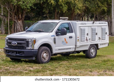 Fort Lauderdale, Florida / USA - 4/3/2020: Broward County Animal Care And Adoption Center Field Enforcement Not A Dog Catcher Truck Or Wild Nuisance Cat Hoarding Vehicle For Pound Or Shelter Pets. 