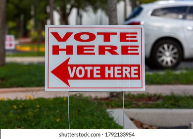 Fort Lauderdale, Florida, USA - August 08, 2020: Vote Here Sign Outdoor. Early Voting 2020 In Florida, United States During COVID-19 Pandemic