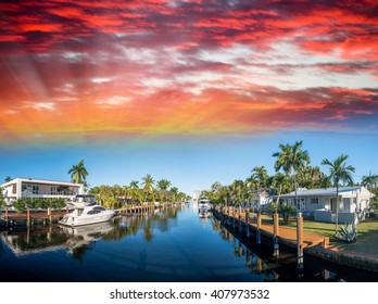 Fort Lauderdale at sunset, Florida. Canals and homes along the river.