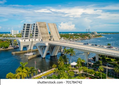 FORT LAUDERDALE, USA - JULY 11, 2017: Aerial view of an opened draw bridge raised to let ship pass through at harbor in Fort Lauderdale, Florida