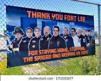 Fort Lee, NJ - May 31 2020: A Thank You Fort Lee Poster On A Chain Link Fence Featuring First Responders  During The 2020 Coronavirus Pandemic