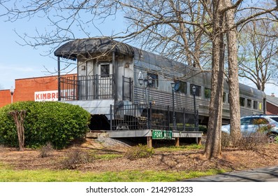 FORT MILL, S.C.-2 APRIL 22: A Railroad Dining Car Setting In A Residential Yard, With A Fort Mill Sign  In Front.