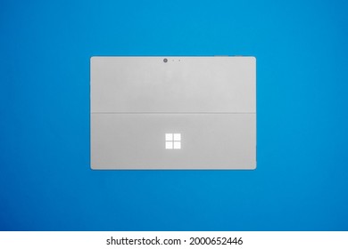 Fort Myers, FL  USA - 7-1-2021:  The Microsoft Surface Pro 4, 5th Gen Intel Core M 4GB RAM Isolated On Blue Background