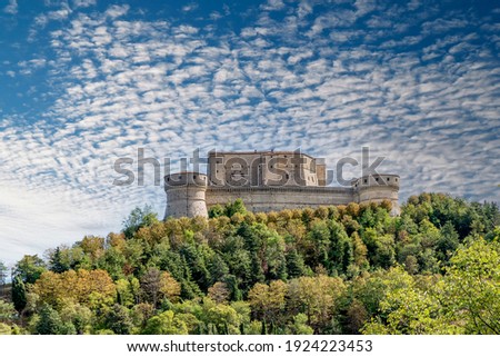 The Fort of San Leo, also known as the Rocca di San Leo, Rimini, Italy, under a dramatic sky