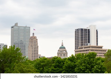 Fort Wayne, City In The State Of Indiana, USA, The Skyline Emerges Behind Trees