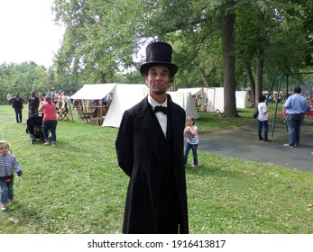 Fort Wayne, Indiana, USA - September 19 2014: President Abraham Lincoln Impersonator At The Johnny Appleseed Festival Educating Children About The Civil War And Freeing Slaves. Black Lives Matter. BLM