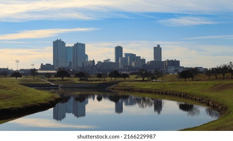 Fort Worth, Texas, United States - January 10, 2020: View Of The Fort Worth Skyline Reflected On The Trinity River. Taken On A Sunny Day. 