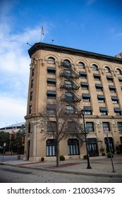 Fort Worth, Texas - USA - January 1, 2022 - An Historic Apartment Building In Downtown With A Fire Escape Is Seen On A Sunny Winter Day With A Blue Sky.