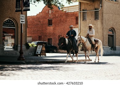 FORT WORTH, TEXAS, USA - SEPTEMBER 24: Cowboys in the Fort Worth Stockyards historic district. Septemberl 24, 2013 in Fort Worth, Texas, USA