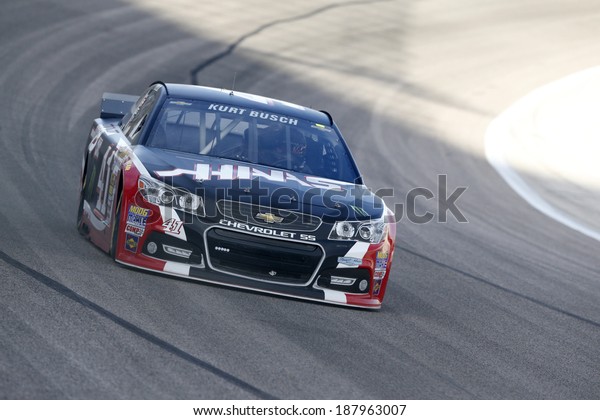 Fort\
Worth, TX - Apr 04, 2014:  Kurt Busch (41) brings his race car\
through the turns during a practice session for the Duck Commander\
500 at Texas Motor Speedway in Fort Worth,\
TX.