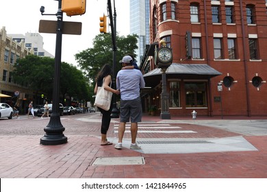 Fort Worth, TX / US - May 2018: Couple Walking In Downtown Fort Worth Sundance Square