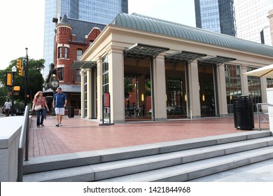 Fort Worth, TX / US - May 2018: Couple Walking In Downtown Fort Worth Sundance Square