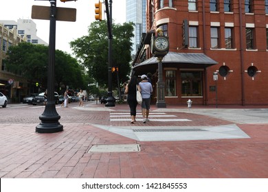 Fort Worth, TX / US - May 2018: Couple Walking In Downtown Fort Worth Sundance Square