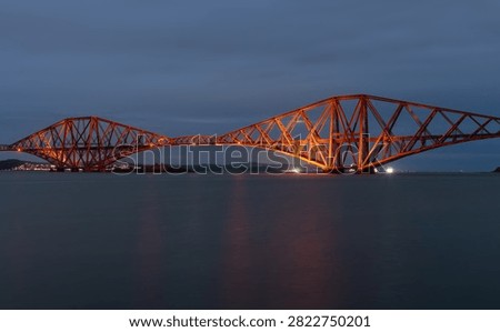 The Forth Rail Bridge at dusk over Firth of Forth, Edinburgh, Scotland, United Kingdom
