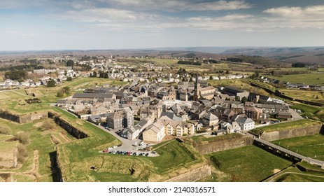 The fortified town of Rocroi in northern France. Aerial drone shots of the fortified town showing the distinctive star shape and walled defences dating from the 16th Century. - Shutterstock ID 2140316571