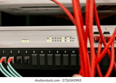 Fortinet FortiGate network firewall with multiple Ethernet ports and LED status indicators, used for network security and traffic management