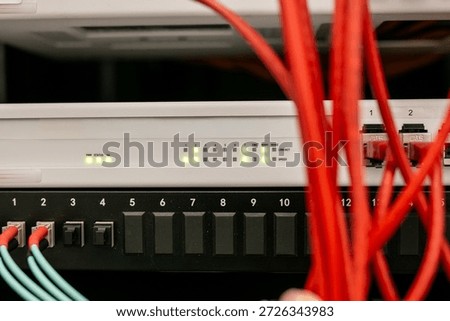 Fortinet FortiGate network firewall with multiple Ethernet ports and LED status indicators, used for network security and traffic management
