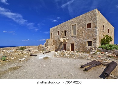 Fortress of Fortezza in Rethymno, Crete, Greece. Rusty old defensive guns in courtyard. - Shutterstock ID 706470250