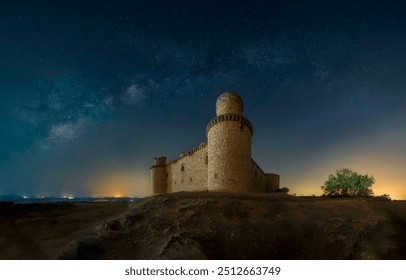 Fortress tower on night sky. Medieval fortress. Fortress walls. The tower of the old fortress at dawn - Powered by Shutterstock