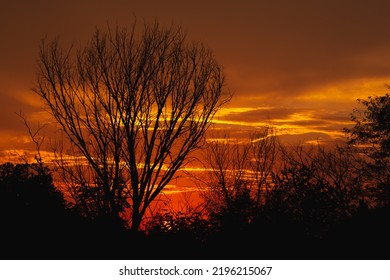 Fortuna, Missouri - October 22, 2020:  A Vibrant Sunset In Rural Missouri Farmland.