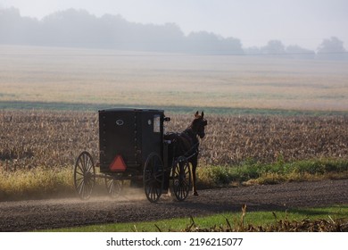 Fortuna, Missouri - October 22, 2020:  An Amish Horse And Buggy In Rural Missouri Farmland.