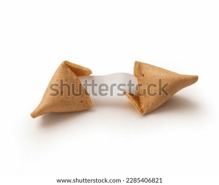 fortune cookie opened with leaflet. space for writing. isolated white background