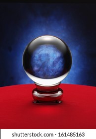 Fortune Teller Crystal Ball On Red Desk