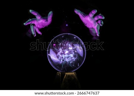Fortune teller hands casting a spell over a crystal ball for divination, foresight, Halloween ritual in the darkness of the night