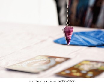 Fortune telling at Tarot Pendulum - Powered by Shutterstock