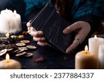 Fortune-telling on tarot cards, the hands of a fortune-teller