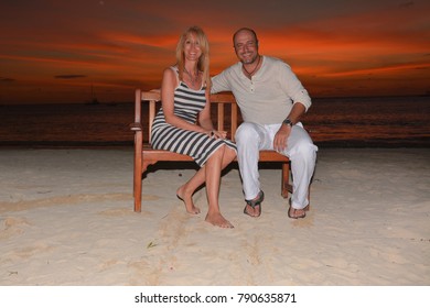 Forty Five Years Old Couple On Tropical Beach At Sunset