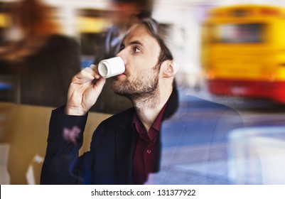 Forty Years Old Businessman Drinking Espresso Coffee In The City Cafe During Lunch Time