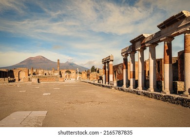 The Forum And Volcano Vesuvius In The Background, Pompei Archeological Site, Naples, Italy.