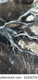 fossil arteries, vertical abstract photography of the deserts of Africa from the air, aerial view of desert landscapes, Genre: Abstract Naturalism, from the abstract to the figurative, 