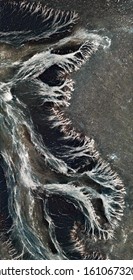 fossil arteries, vertical abstract photography of the deserts of Africa from the air, aerial view of desert landscapes, Genre: Abstract Naturalism, from the abstract to the figurative, 