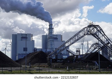 Fossil Fuel (coal) Power Station And Wind Turbines In The Eemshaven Generating Power.