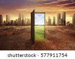 Found new world with green environment from open wooden door against cityscape background