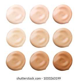Foundation face make-up samples. Set of cosmetic liquid foundation or cream in different colour smudge smear strokes. Make up smears isolated on a white background. Foundation colors palette