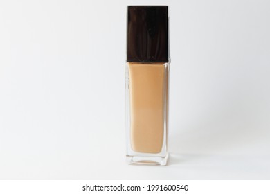 Foundation makeup bottle isolated concept. 