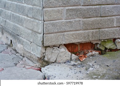 Foundation Repair - Warning Signs. House Foundation Repair. Foundation Repair. Broken Foundation House Brick Wall.