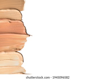 Foundation smuges, face make-up samples. Set of cosmetic liquid foundation or cream in different colour smudge smear strokes. Make up smears isolated on a white background. Foundation colors palette. 