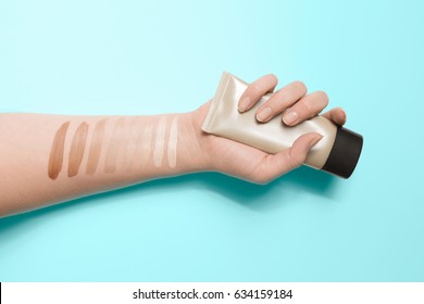 Foundation Swatches On Hand, Woman Holding Makeup Tube, Testing Different Shades