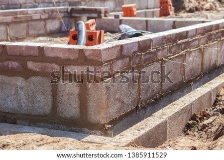 Foundation work of the house, blockwork, selective focus