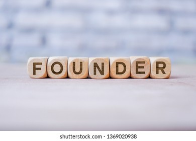 Founder word written on wood block - Shutterstock ID 1369020938