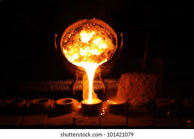 Foundry - molten metal poured from ladle